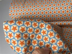 Bomuldsjersey - retro stjerner i orange / denim blå